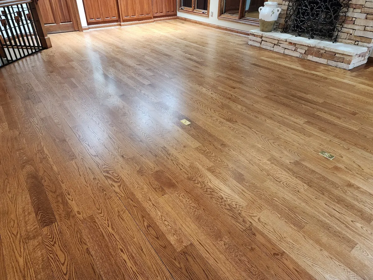 Refinished hardwood running through a living room